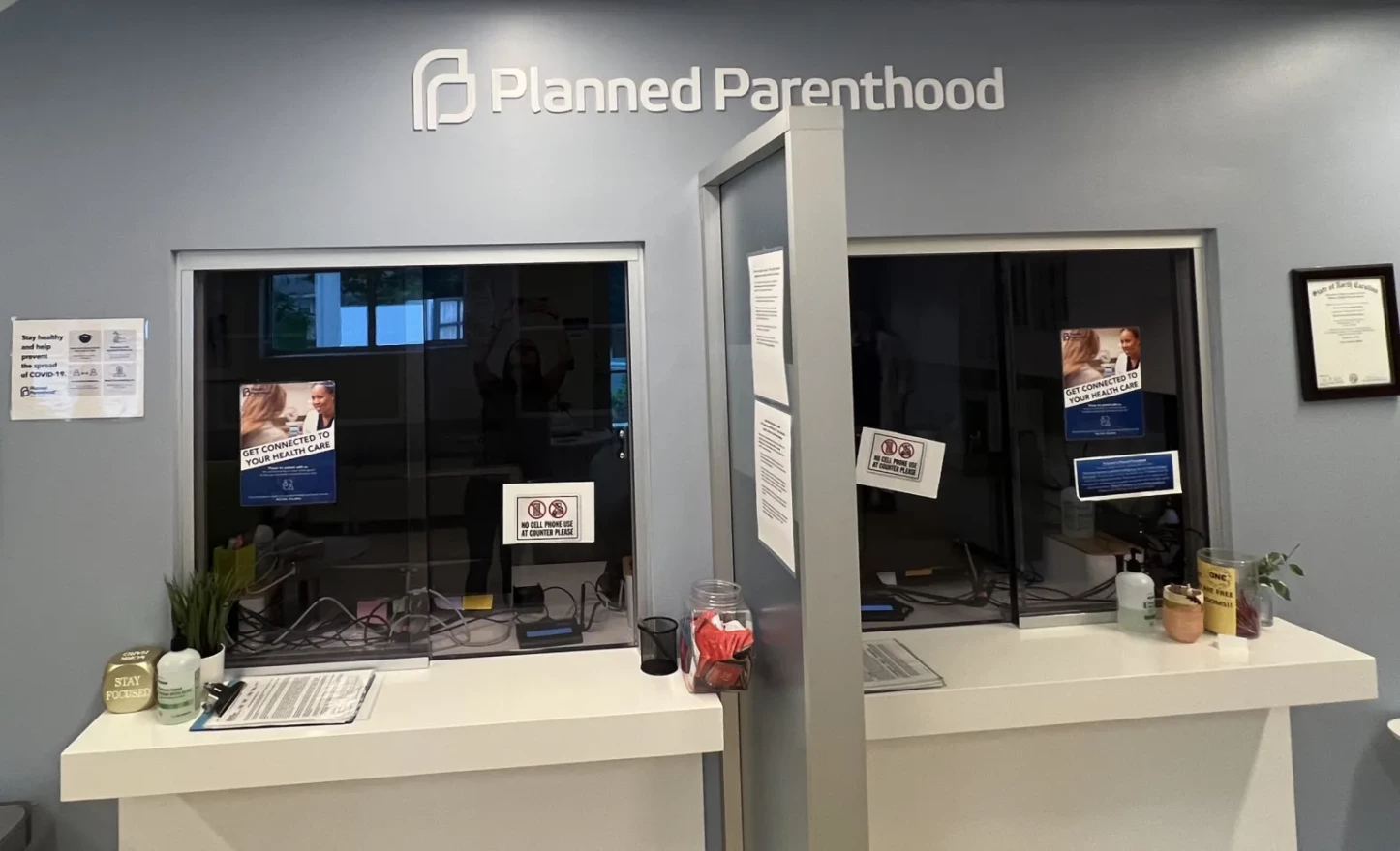 The patient check-in window at Planned Parenthood's Winston Salem clinic. More so than the narrowed gestational limit for seeking an abortion in the state, abortion providers say the most burdensome part of the law is the requirement that a patient go to an in-person appointment for state-mandated counseling at least 72 hours before an abortion. As a result, patients are required to visit clinics at least twice.